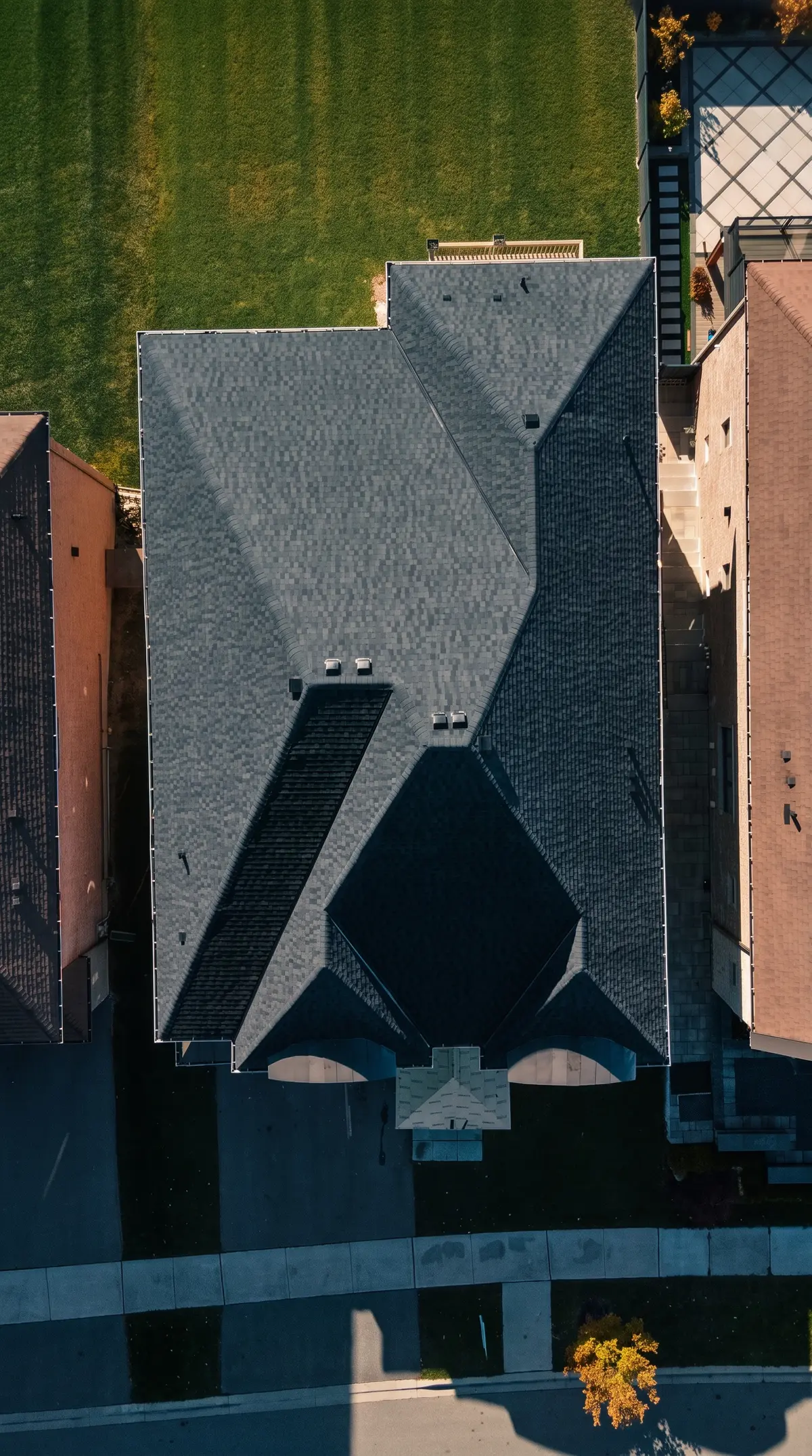 After: the same King City roof with new dark shingles, from straight above